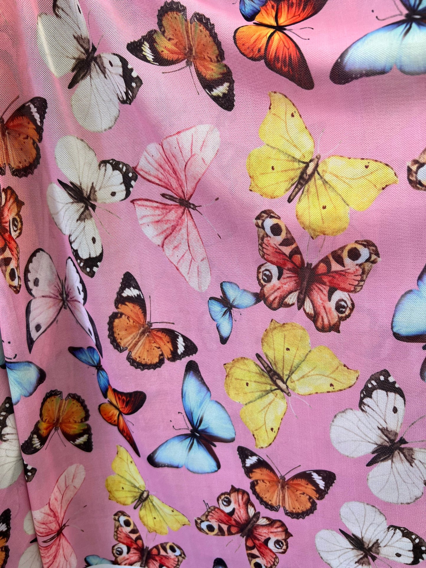 Butterfly design Pink Multicolor print on great quality of power mesh 4-way stretch 58/60” Sold by the YD. Ships Worldwide from Los Angeles