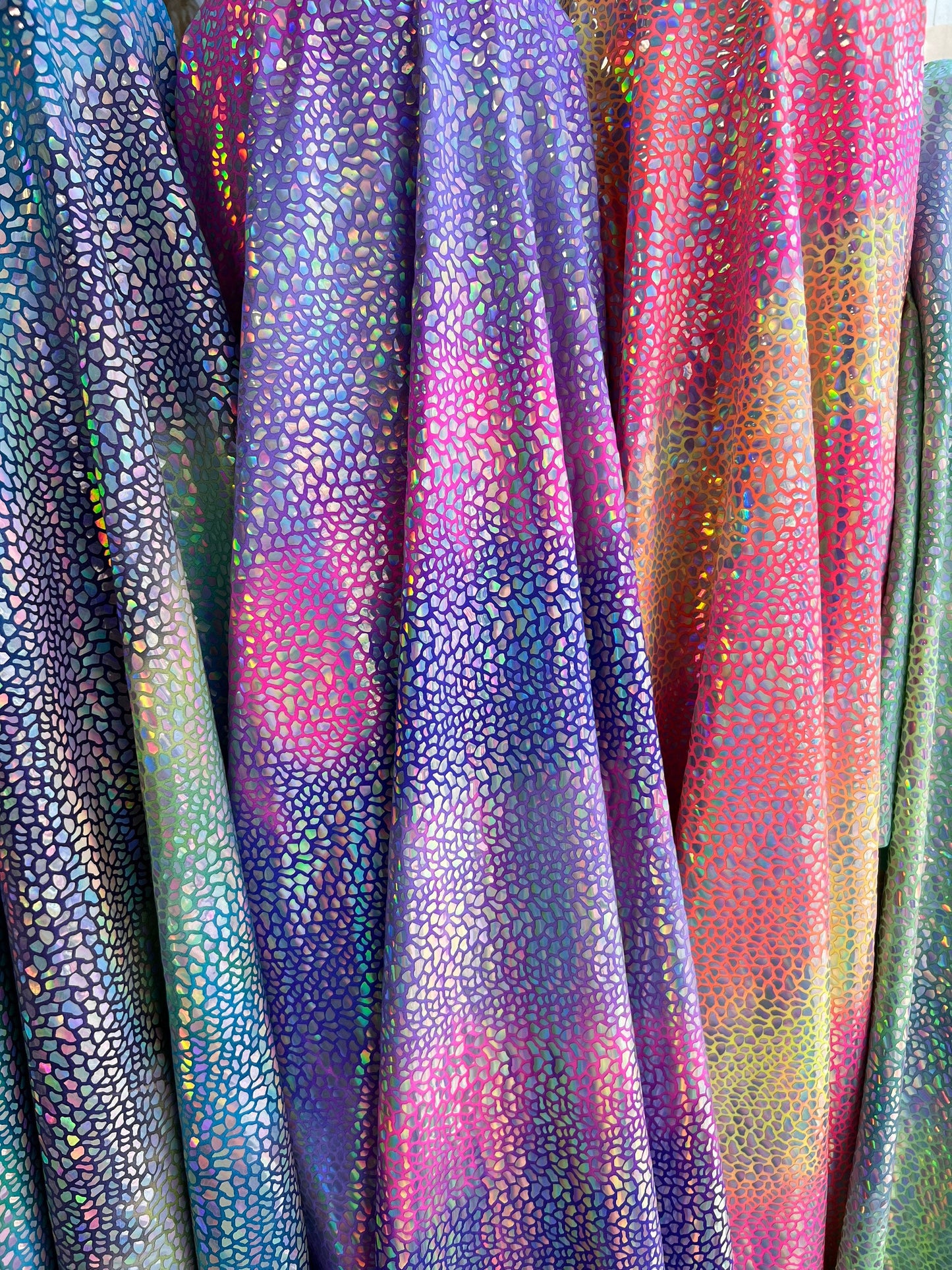 New Dragon hologram sequins on tie dye spandex Lacer sequins 4-way stretch 58/60” Sold by the YD. Ships Worldwide from Los Angeles CA