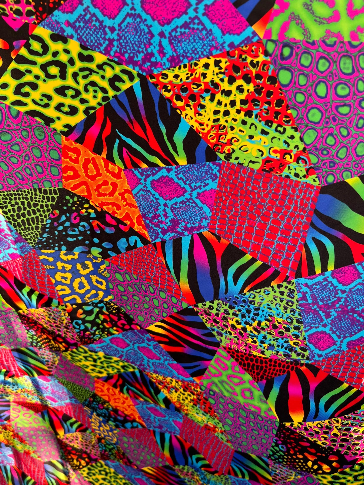 Exotic Safari design multi animal print on best quality of nylon spandex 4-way stretch 58/60” Sold by the YD. Ships Worldwide from LA CA.