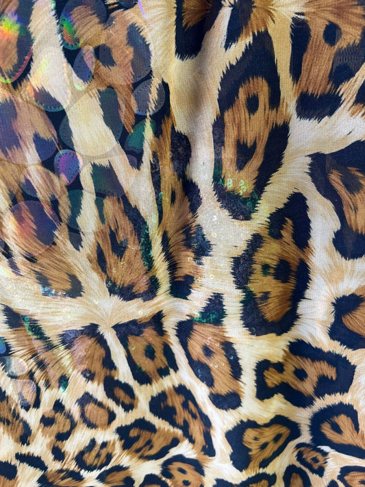Jaguar design print on great quality of power mesh 4-way stretch 58/60” Sold by the YD. Ships Worldwide from Los Angeles California USA.
