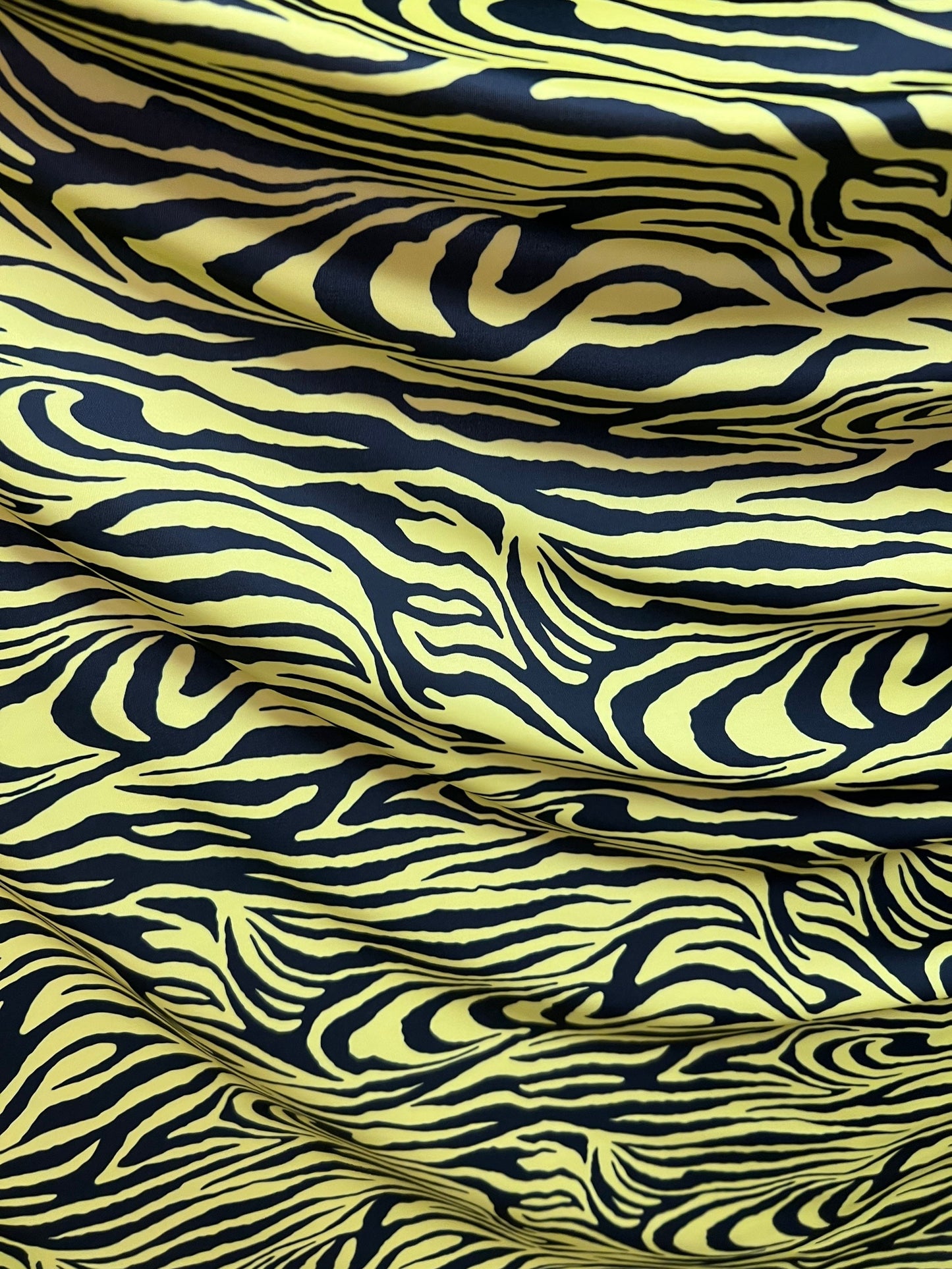 Exotic Zebra design yellow/black print on best quality of nylon spandex 4-way stretch 58/60” Sold by the YD. Ships Worldwide from Los  CA