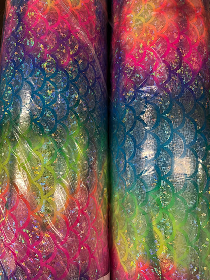Rainbow mermaid design hologram metallic Nylon spandex 4-way stretch 58/60” Sold by the YD.