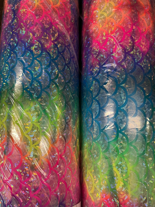 Rainbow mermaid design hologram metallic Nylon spandex 4-way stretch 58/60” Sold by the YD.