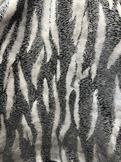 Exotic Tiger design print on stretch velvet with foil 4-way stretch 58/60” Sold by the YD.