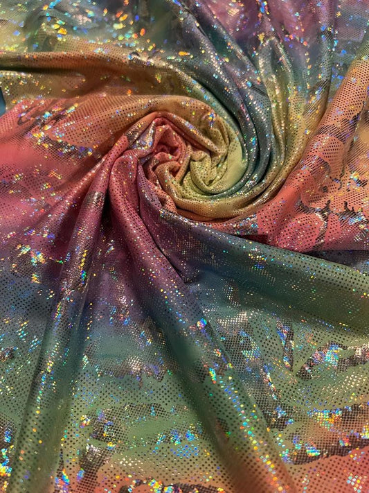 New abstract design hologram metallic poly spandex Rainbow multi pastel colors 2-way stretch 58/60” Sold by the YD.