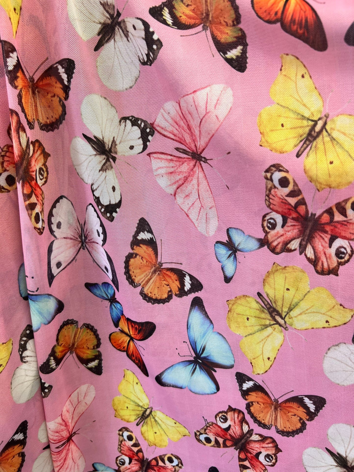 Butterfly design Pink Multicolor print on great quality of power mesh 4-way stretch 58/60” Sold by the YD. Ships Worldwide from Los Angeles