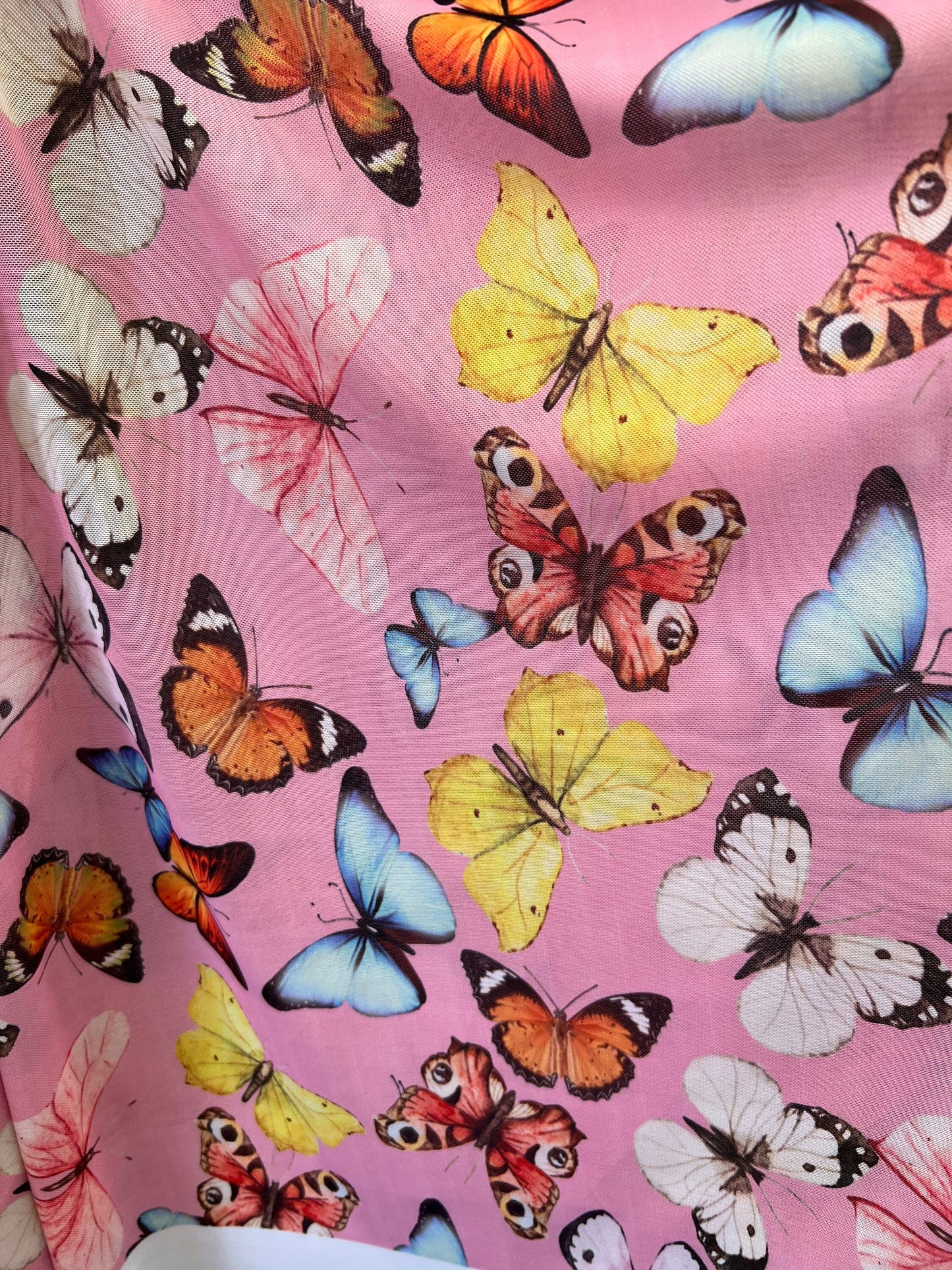 Butterfly design Pink Multicolor print on great quality of power mesh 4-way stretch 58/60” Sold by the YD. Ships Worldwide from Los Angeles