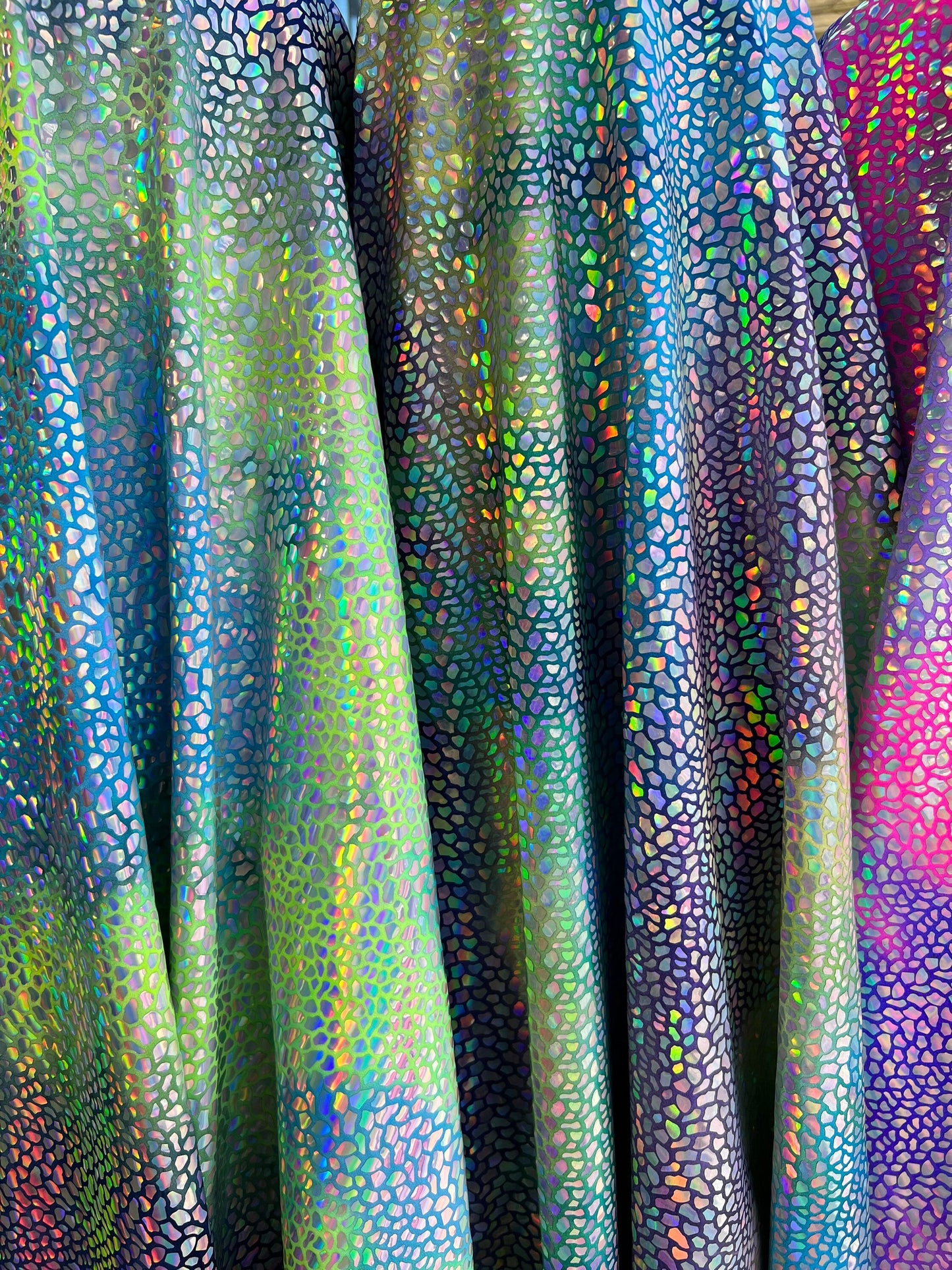New Dragon hologram sequins on tie dye spandex Lacer sequins 4-way stretch 58/60” Sold by the YD. Ships Worldwide from Los Angeles CA