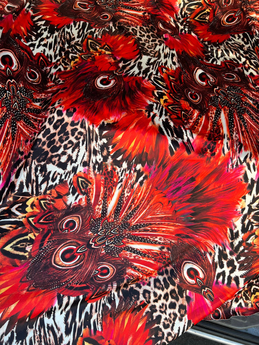 Hiding Leopard & Peacock design exotic animal print on yoga poly spandex 4-way stretch 58/60” Sold by the YD. Ships Worldwide