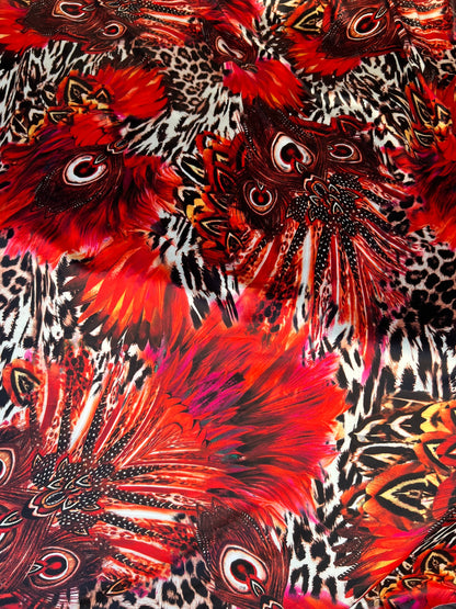 Hiding Leopard & Peacock design exotic animal print on yoga poly spandex 4-way stretch 58/60” Sold by the YD. Ships Worldwide