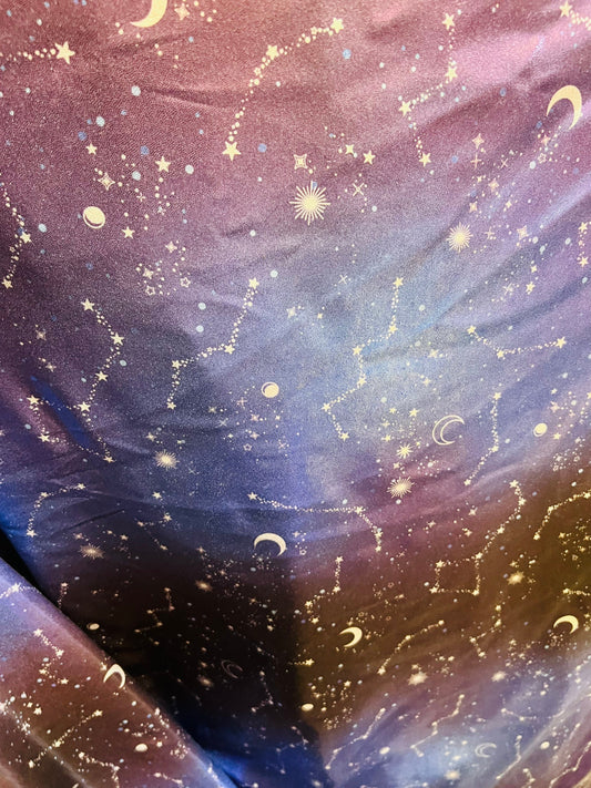 Celestial design print on ombré  all over foil metallic nylon spandex 4-way stretch 58/60” Sold by the YD. Ships Worldwide