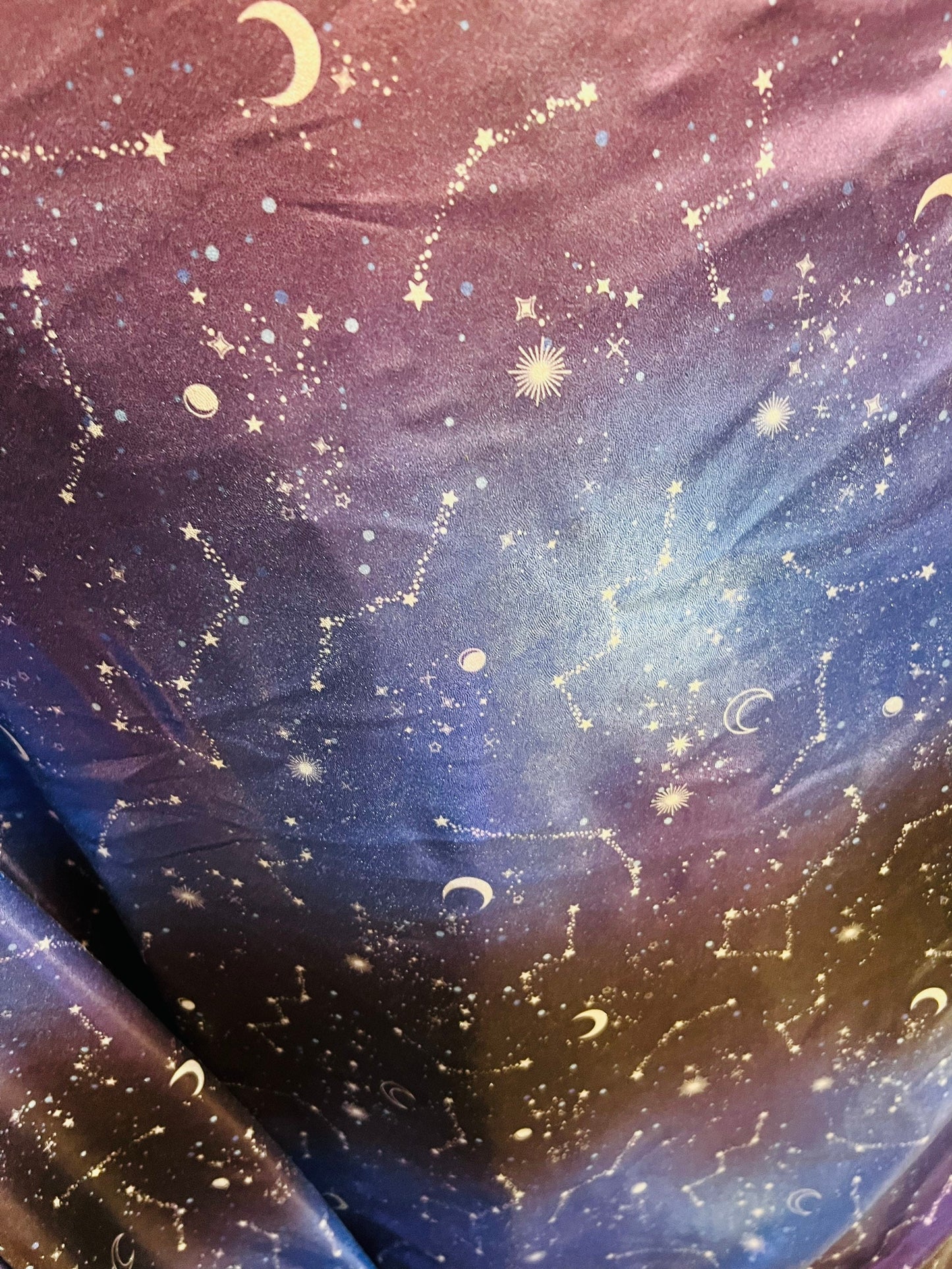 Celestial design print on ombré  all over foil metallic nylon spandex 4-way stretch 58/60” Sold by the YD. Ships Worldwide