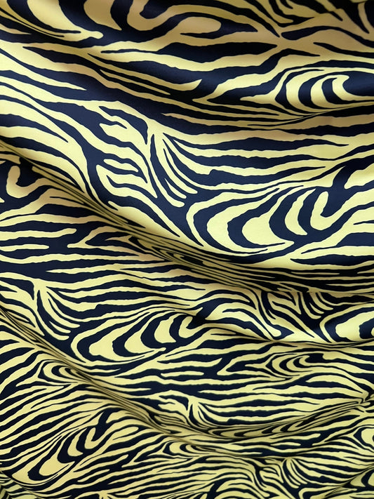 Exotic Zebra design yellow/black print on best quality of nylon spandex 4-way stretch 58/60” Sold by the YD. Ships Worldwide from Los  CA