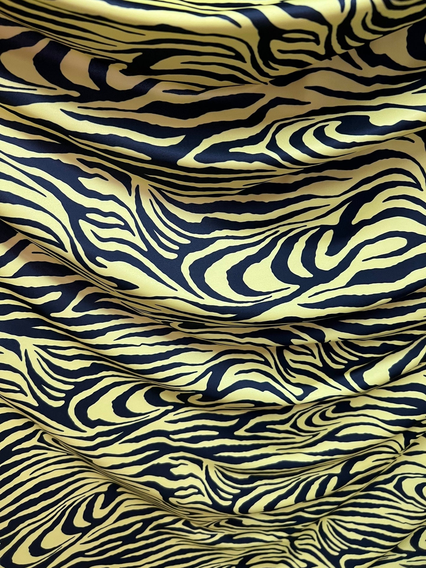 Exotic Zebra design yellow/black print on best quality of nylon spandex 4-way stretch 58/60” Sold by the YD. Ships Worldwide from Los  CA