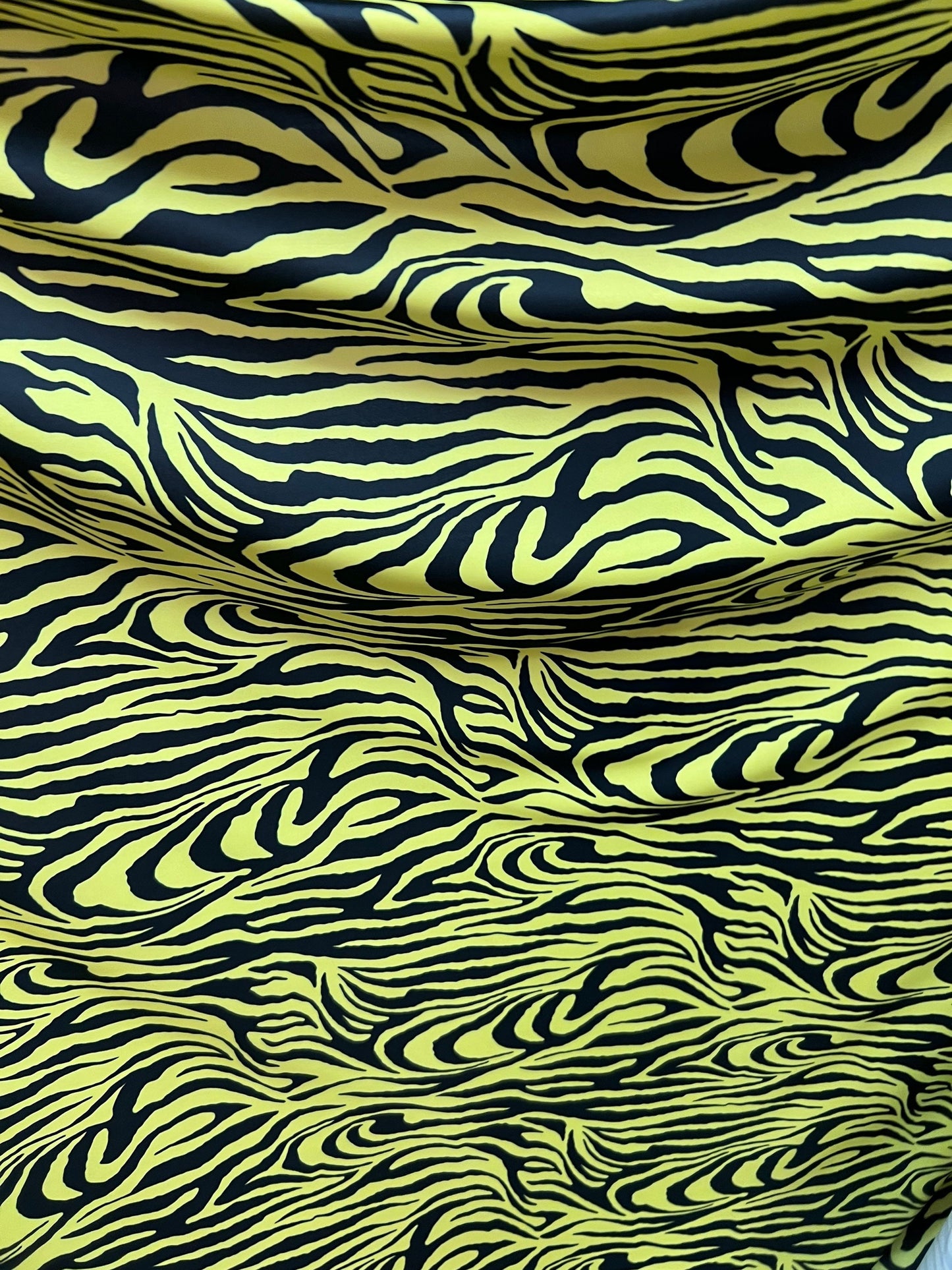 Exotic Zebra design yellow/black print on best quality of nylon spandex 4-way stretch 58/60” Sold by the YD. Ships Worldwide from Los  CA