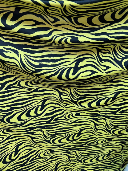 Exotic Zebra design yellow/black print on best quality of nylon spandex 4-way stretch 58/60” Sold by the YD. Ships Worldwide from Los  CA
