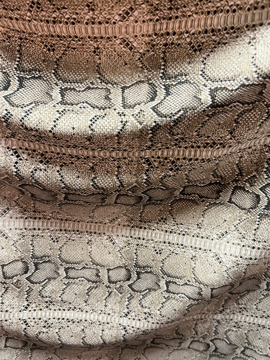 Exotic Snake skin design Natural/Brown print on poly spandex 4-way stretch 58/60” Sold by the YD. Ships Worldwide from Los Angeles CA