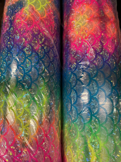 Rainbow mermaid design hologram metallic Nylon spandex 4-way stretch 58/60” Sold by the YD.