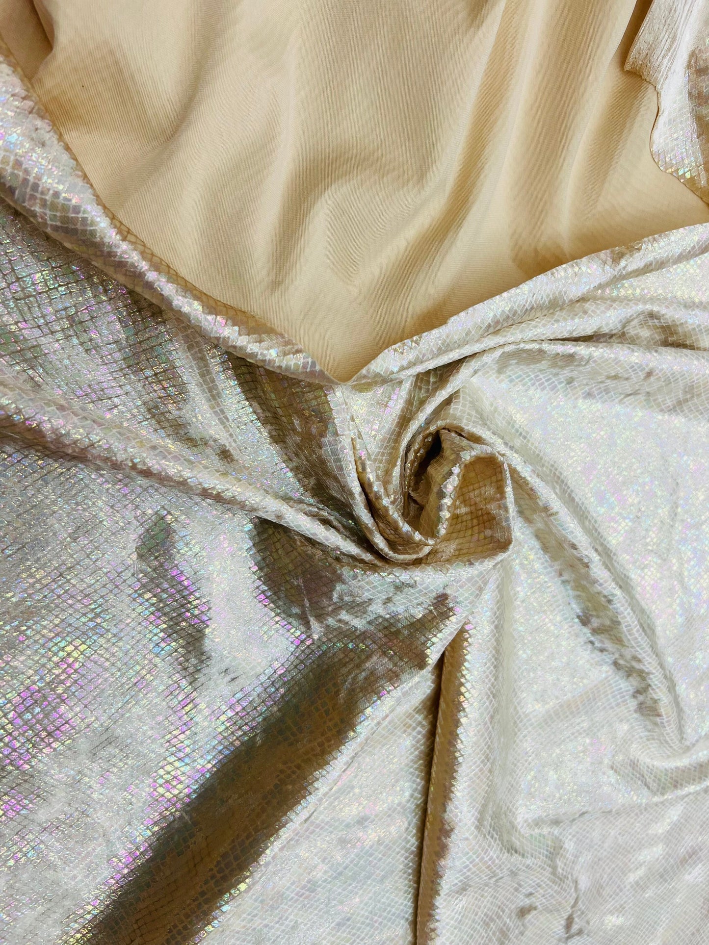 Dragon skin design metallic stretch velvet with ilusión foil nude color 4-way stretch 58/60” Sold by the YD. Ships Worldwide from Los CA