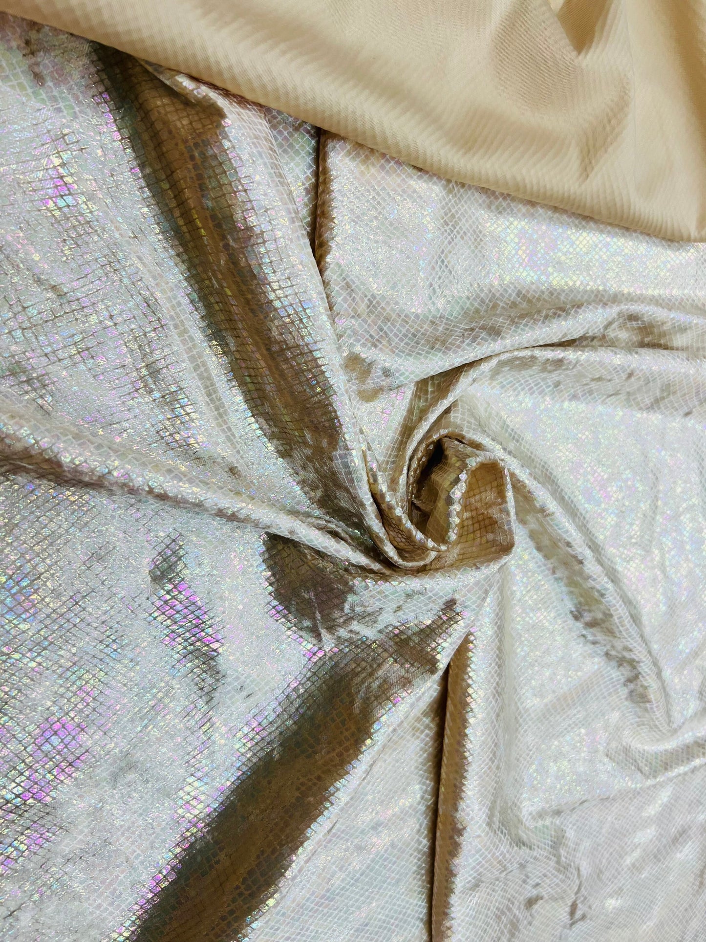Dragon skin design metallic stretch velvet with ilusión foil nude color 4-way stretch 58/60” Sold by the YD. Ships Worldwide from Los CA