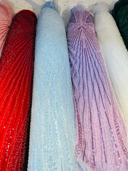 New Jennifer design beaded lace luxury design embroidered on stretch mesh 2-way 55/57” Sold by the YD. Ships Worldwide from Los Angeles Cali