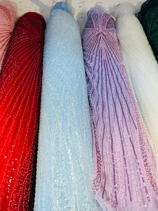 New Jennifer design beaded lace luxury design embroidered on stretch mesh 2-way 55/57” Sold by the YD. Ships Worldwide from Los Angeles Cali