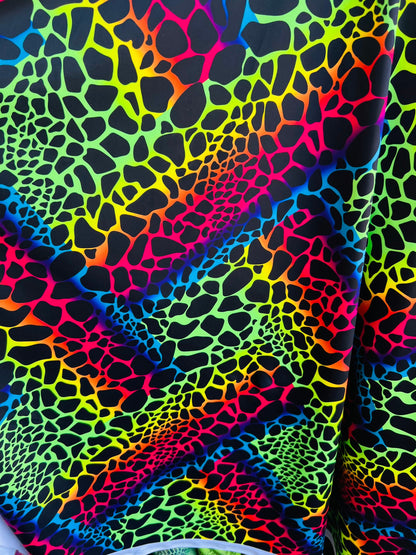 New Exotic Giraffe design rainbow color print on best quality of nylon spandex 4-way stretch 58/60” Sold by the YD. Ships Worldwide from L.A