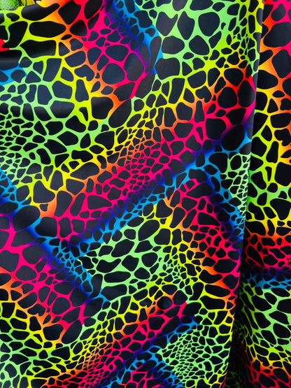 New Exotic Giraffe design rainbow color print on best quality of nylon spandex 4-way stretch 58/60” Sold by the YD. Ships Worldwide from L.A