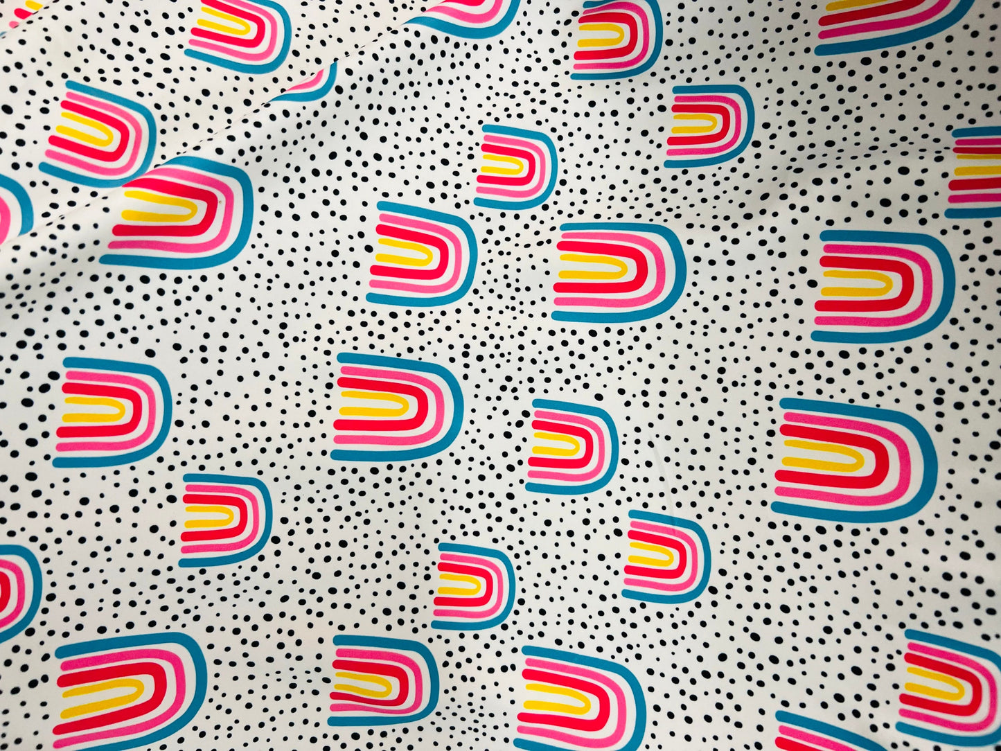 New abstract design white/rainbow print on great quality of Nylon Spandex 4-way stretch 58/60” Sold by the YD. Ships Worldwide from L.A