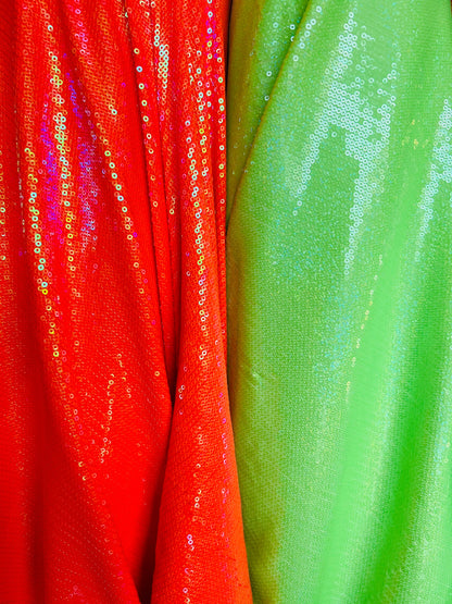 New neon colors iridescent mini sequins design embroidered on spandex base 2-way stretch 58/60” Sold by the YD. Ships Worldwide from L.A