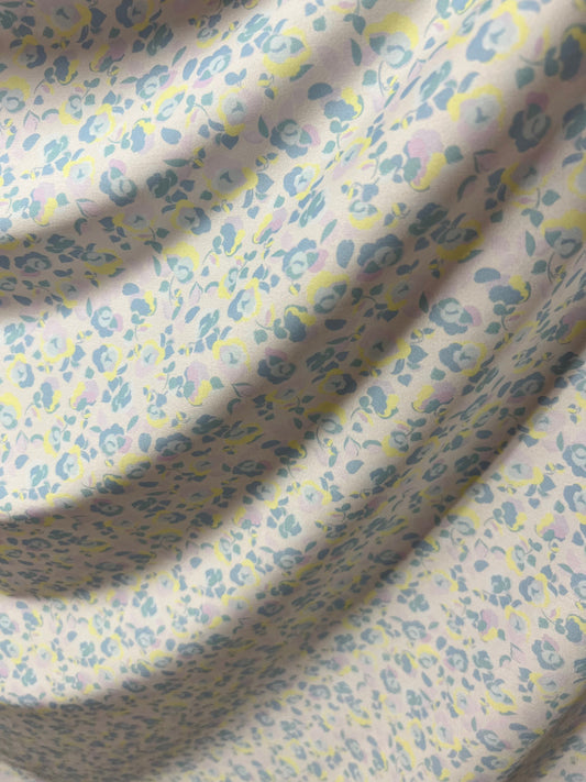 New small  Romantic flowers design pastel multicolor print on best quality of Nylon spandex 4-way stretch 58/60” Sold by the YD.