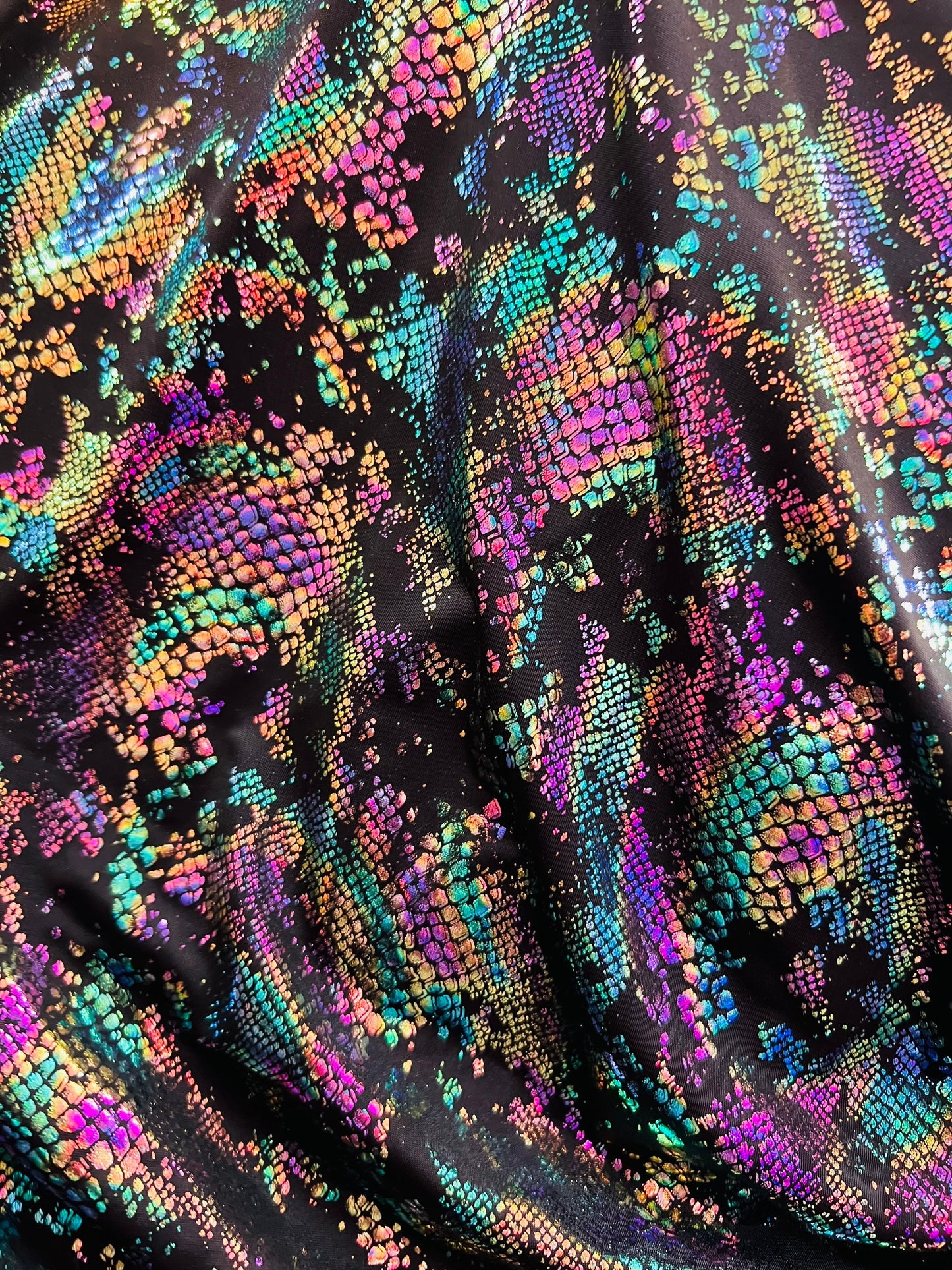 New snake design metallic Poly spandex 2-way stretch 58/60” Sold by the YD. Ships worldwide from Los Angeles California USA.