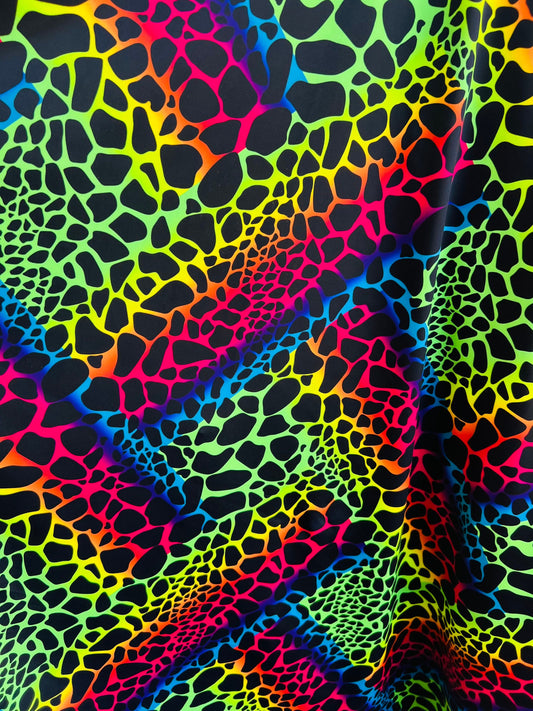 New Exotic Giraffe design rainbow color print on best quality of nylon spandex 4-way stretch 58/60” Sold by the YD. Ships Worldwide from L.A