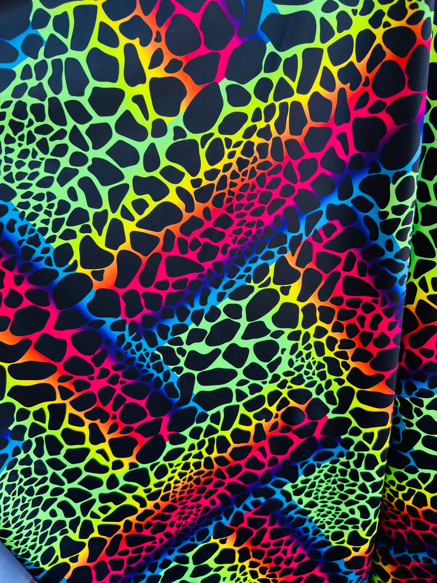 New Exotic Giraffe design rainbow color print on best quality of nylon spandex 4-way stretch 58/60” Sold by the YD. Ships Worldwide from L.A