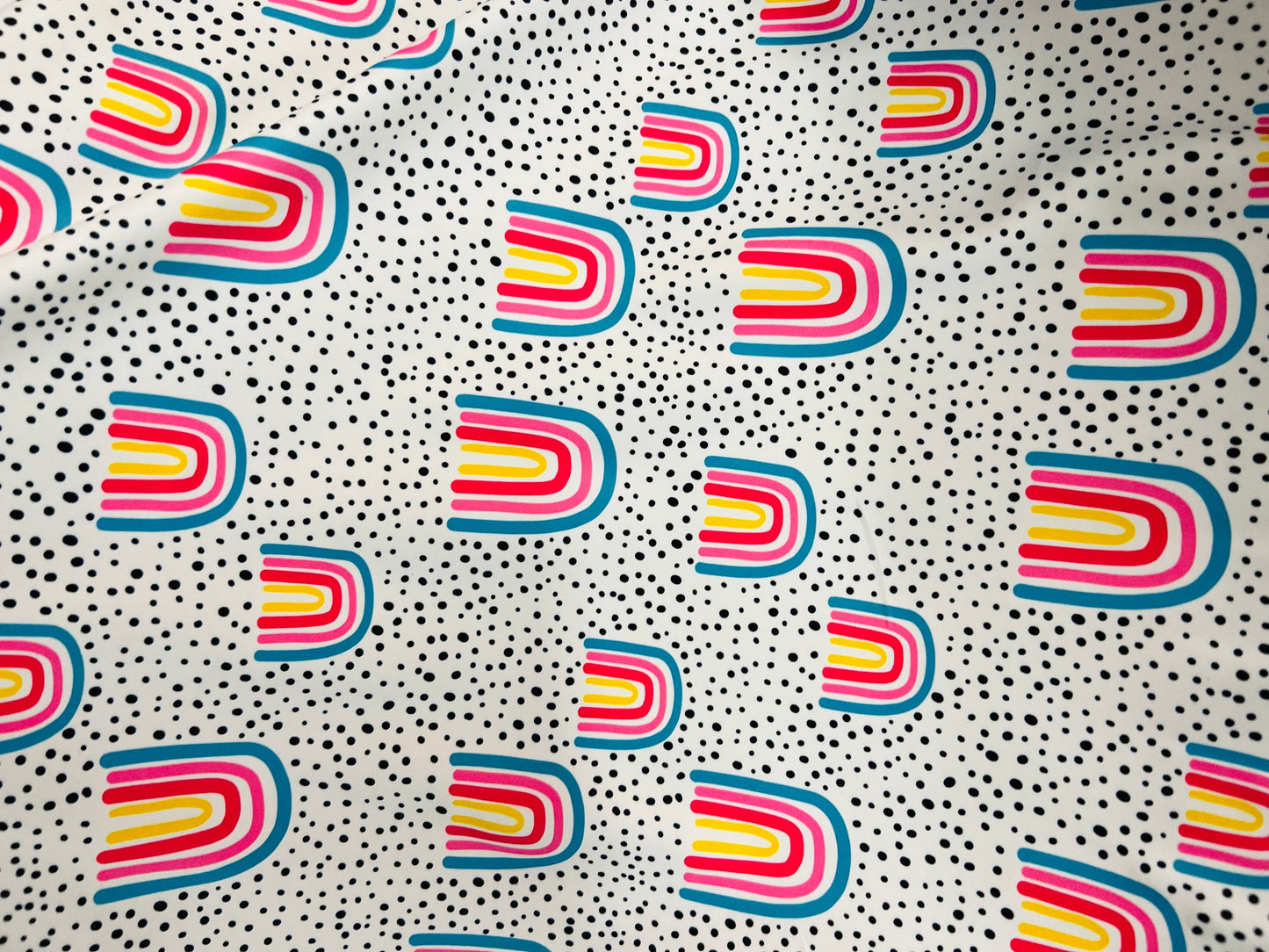 New abstract design white/rainbow print on great quality of Nylon Spandex 4-way stretch 58/60” Sold by the YD. Ships Worldwide from L.A