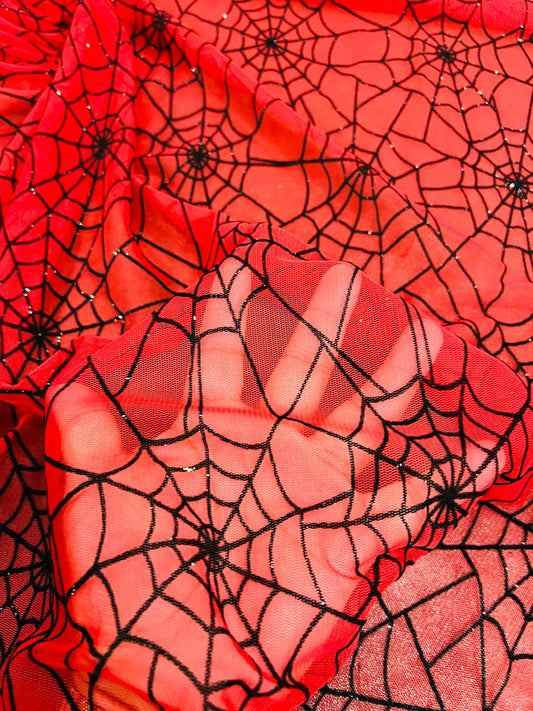 Spiderweb design red/black flocking stretch mesh 2-way stretch 58/60” Sold by the YD. Ships Worldwide from Los Ángeles California USA