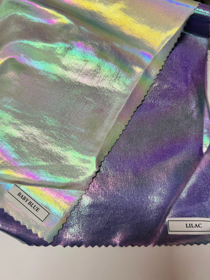 New Lacer Foil Iridescent White Unicorn Metallic Spandex 4-Way 58/60" Sold By The YD. Ships Worldwide From Los Ángeles California USA.
