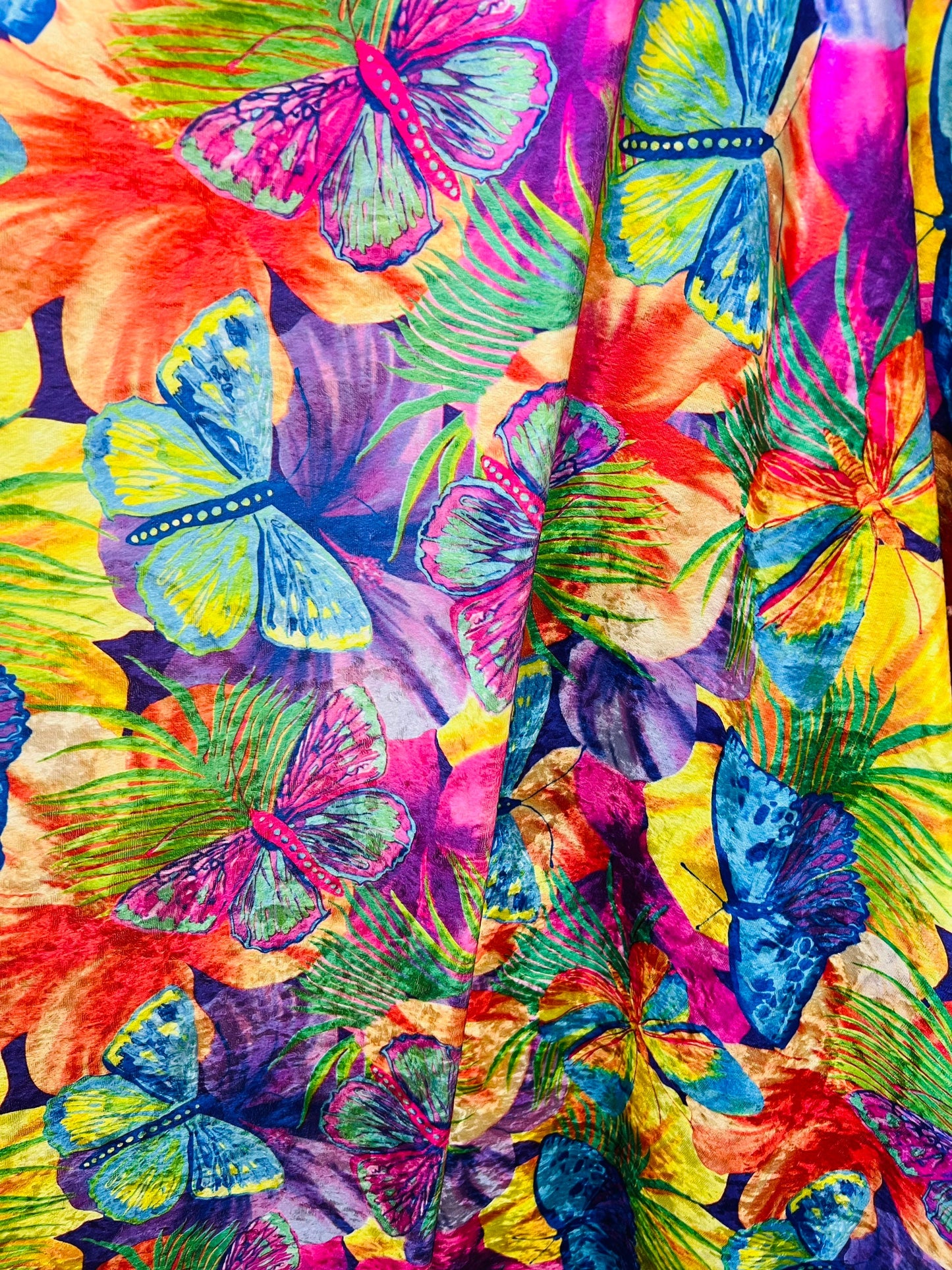 New Butterfly design Rainbow color print on poly velour stretch velvet 2-way stretch and nylon spandex 4way stretch 58/60” Sold by the YD.