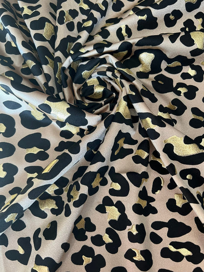 New Exotic Leopard design metallic nylon spandex 4-way stretch it glows in the dark 58/60” Sold by the YD. Ships worldwide from Los Angeles