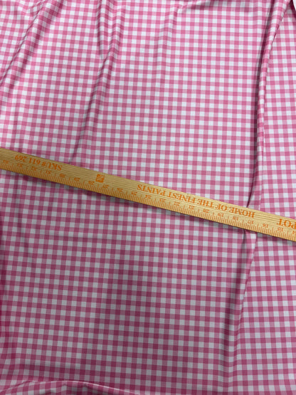 Gingham design pink Nylon spandex 4-way stretch 58/60”Sold by the YD. Ships Worldwide from Los Angeles California USA.