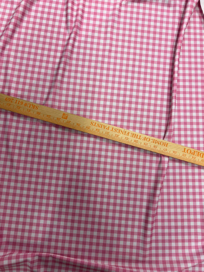 Gingham design pink Nylon spandex 4-way stretch 58/60”Sold by the YD. Ships Worldwide from Los Angeles California USA.