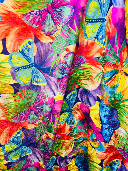 New Butterfly design Rainbow color print on poly velour stretch velvet 2-way stretch and nylon spandex 4way stretch 58/60” Sold by the YD.