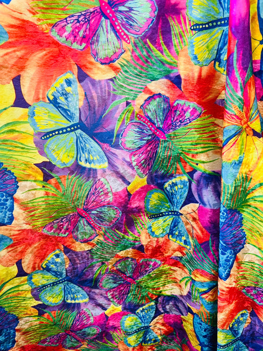 New Butterfly design Rainbow color print on poly velour stretch velvet 2-way stretch and nylon spandex 4way stretch 58/60” Sold by the YD.