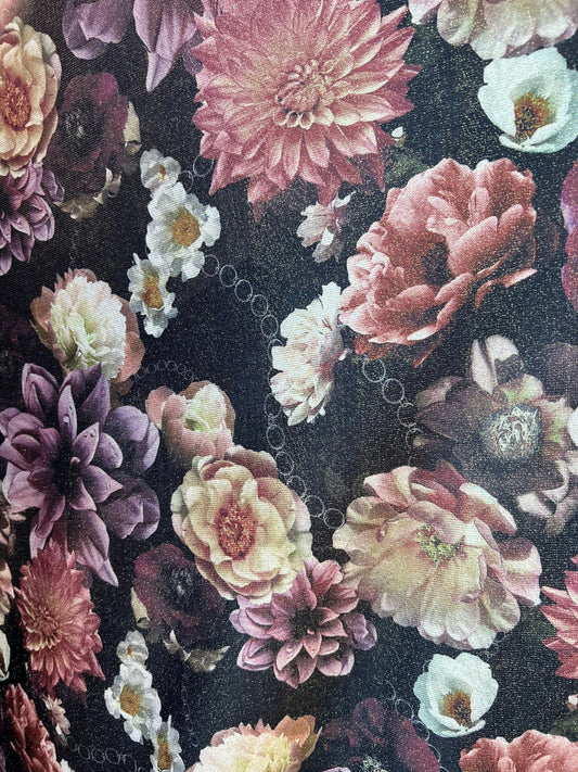 Romantic floral design print on metallic poly spandex 2-way stretch 58/60” Sold by the YD. Ships worldwide from Los Angeles California USA