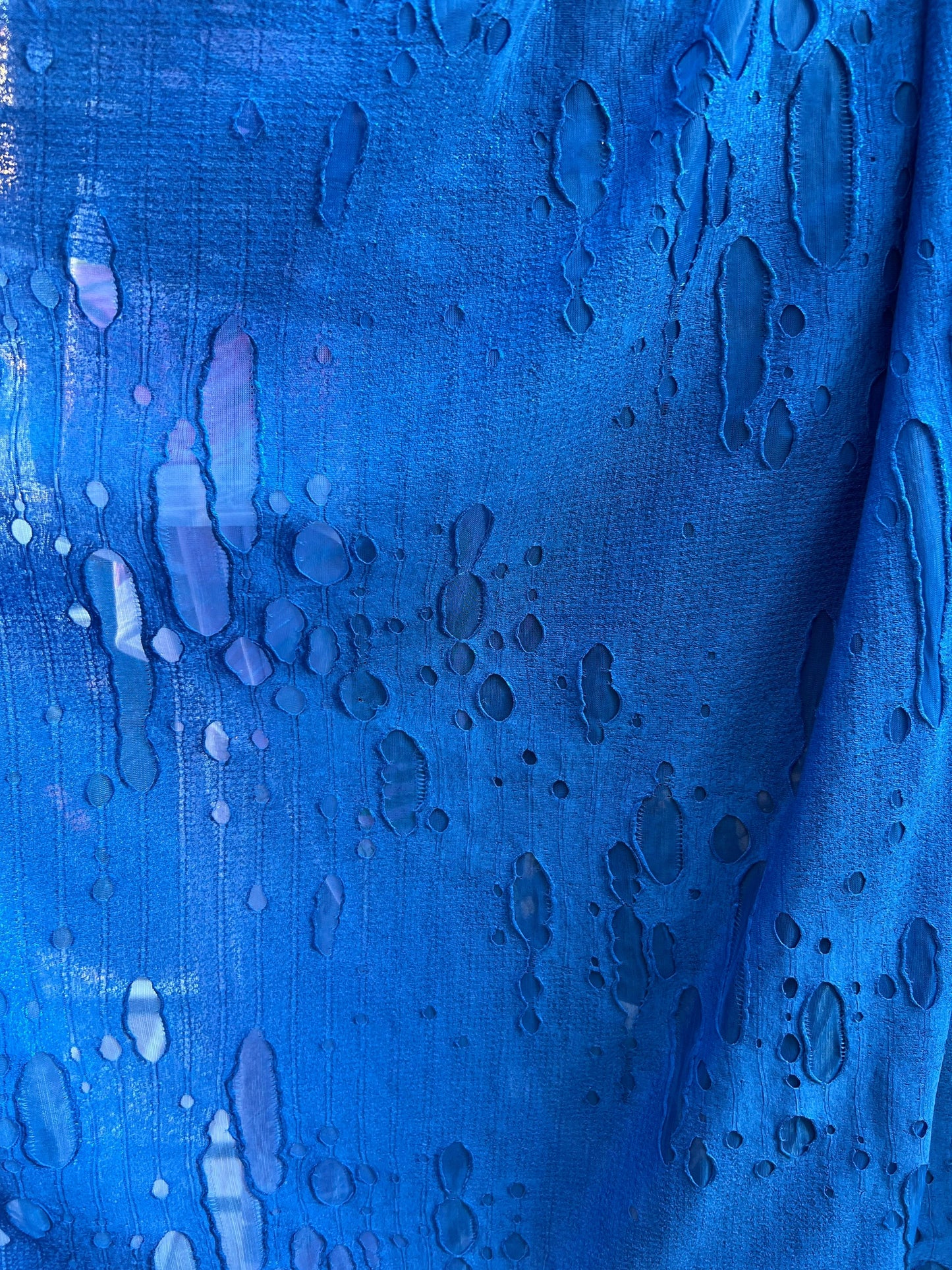 Mummy design sapphire poly spandex 4-way stretch 58/60” Sold by the YD. Ships Worldwide from Los Angeles California USA