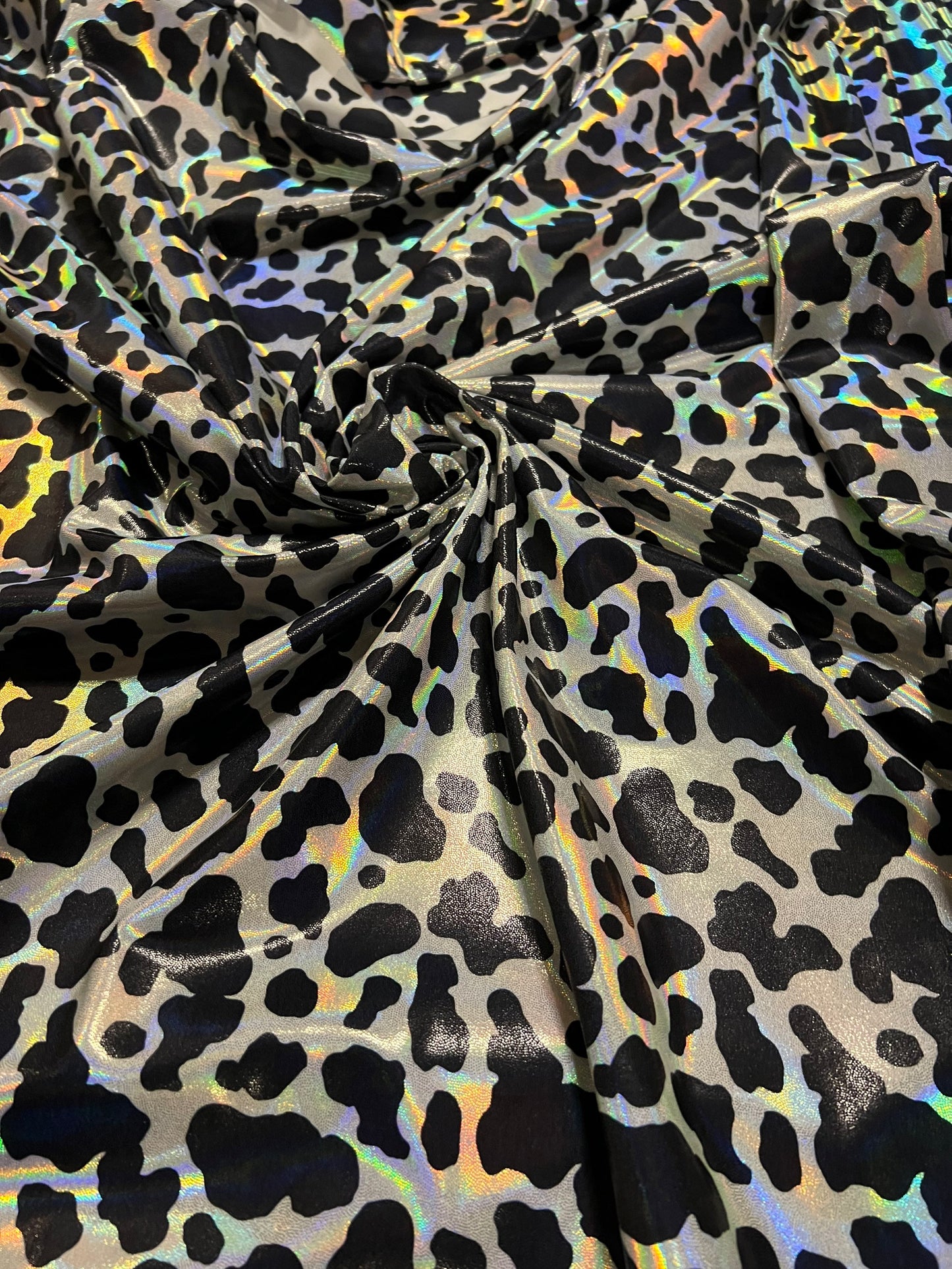 Cow design on Luxury metallic lacer nylon spandex 4-way stretch 58/60” Sold by the YD. Ships worldwide from Los Angeles California USA