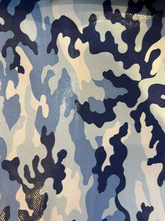 Camouflage design metallic Nylon spandex with clear foil dots 4-way stretch 58/60” Sold by the YD. Ships worldwide from Los Angeles CA