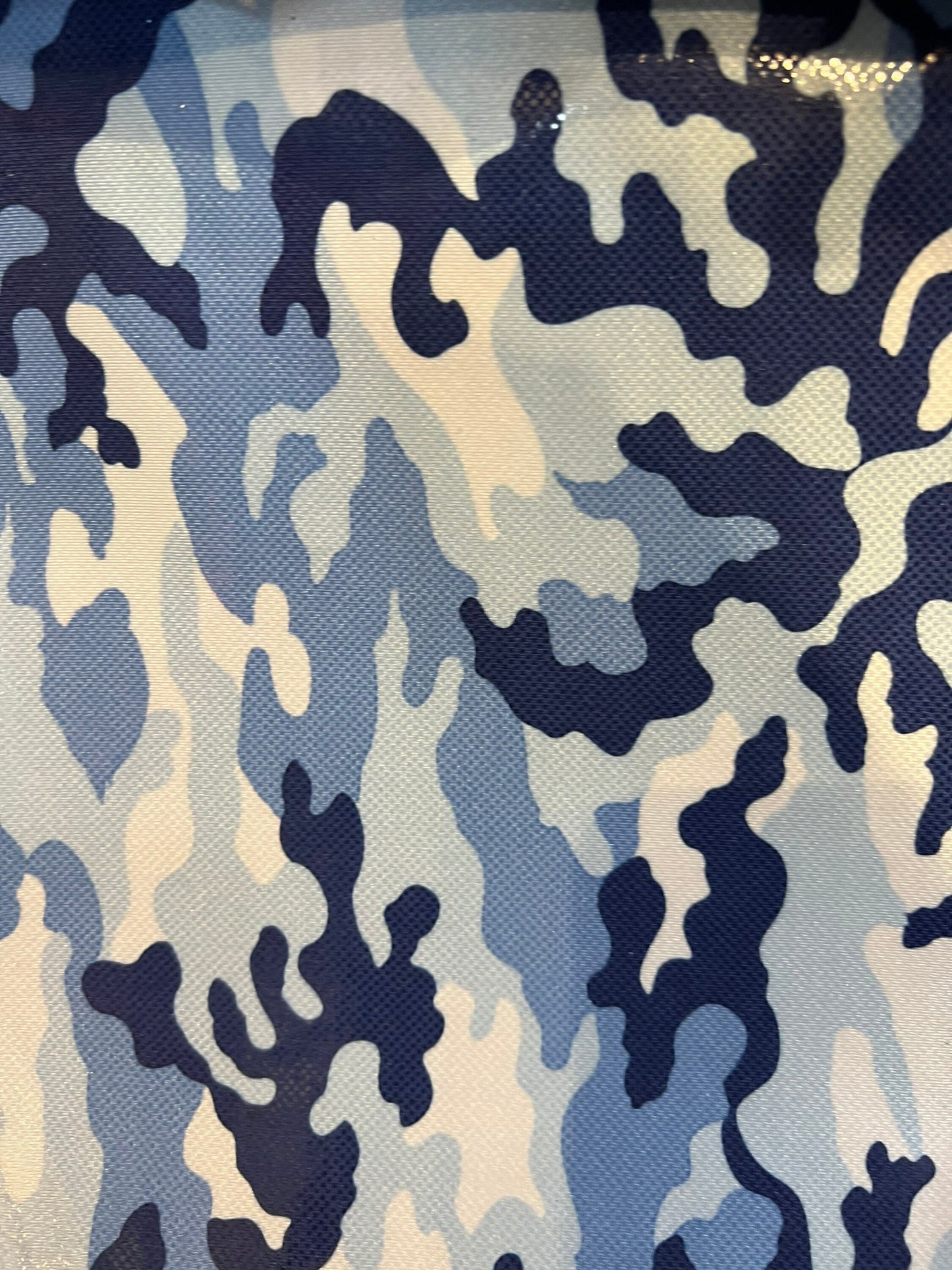 Camouflage design metallic Nylon spandex with clear foil dots 4-way stretch 58/60” Sold by the YD. Ships worldwide from Los Angeles CA
