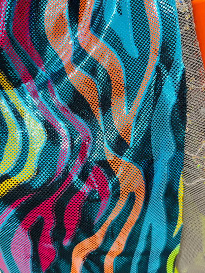 Rainbow zebra design hologram metallic Nylon spandex 4-way stretch 58/60” Sold by the YD. Ships worldwide from Los Angeles California USA