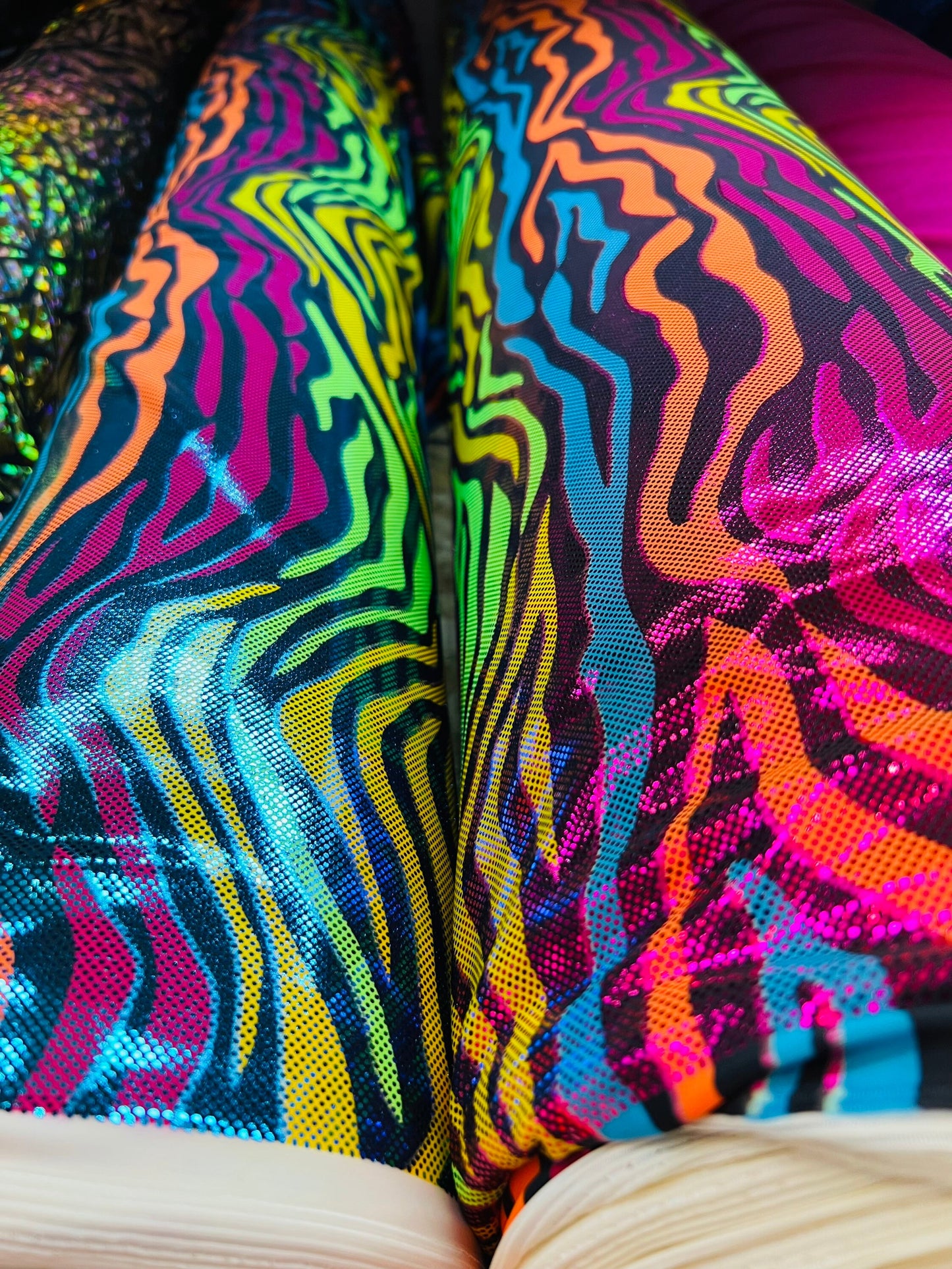 Rainbow zebra design hologram metallic Nylon spandex 4-way stretch 58/60” Sold by the YD. Ships worldwide from Los Angeles California USA